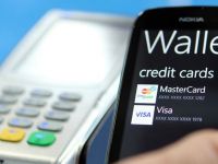 Telefon mobil in loc de card. Nokia aduce tehnologia NFC in Romania