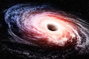 Descoperire fără precedent. Astronomii au zărit pentru prima dată lumină de cealaltă parte a unei găuri negre